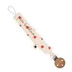 Attache tetine gaze coeurs rouges
